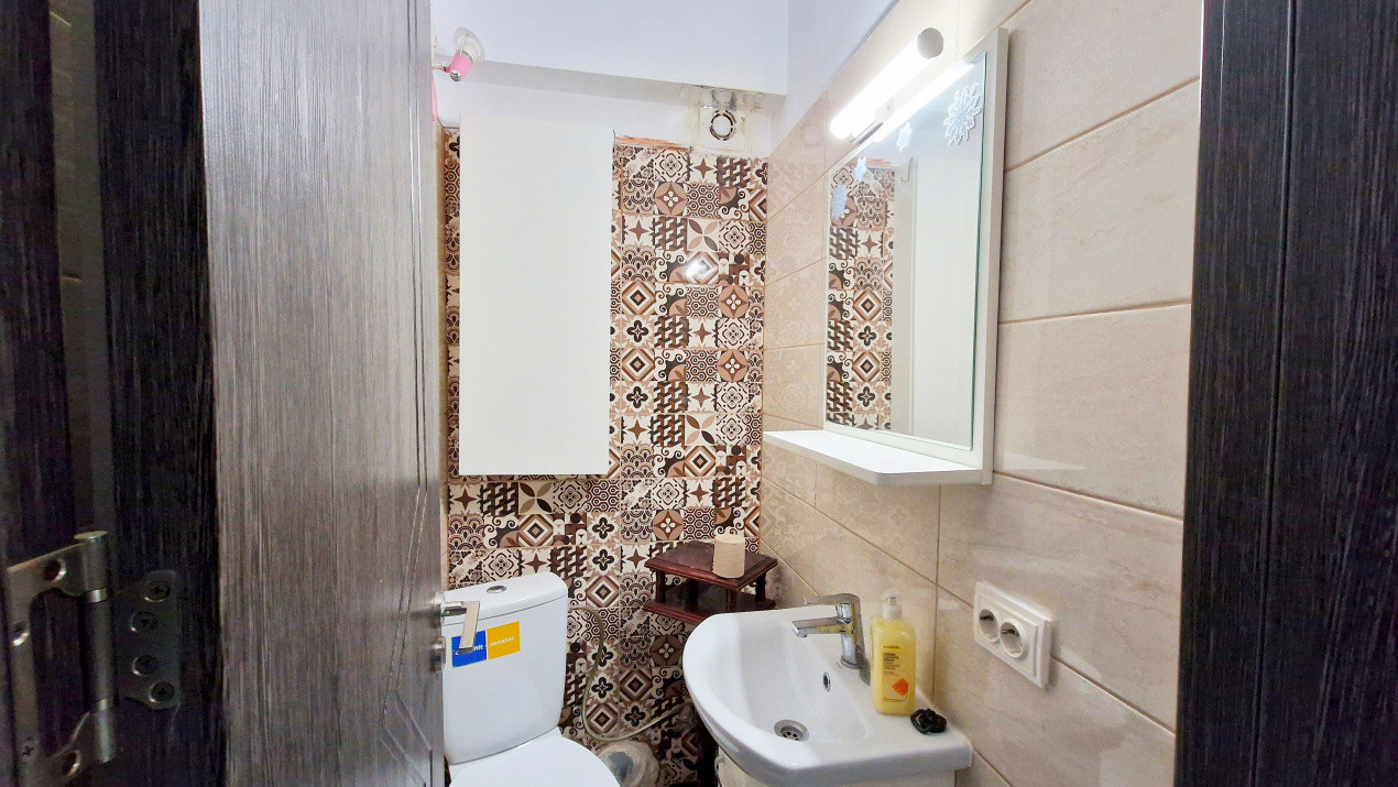 Apartament 3 camere  la demisol, mobilat si utilate cu garaj subteran