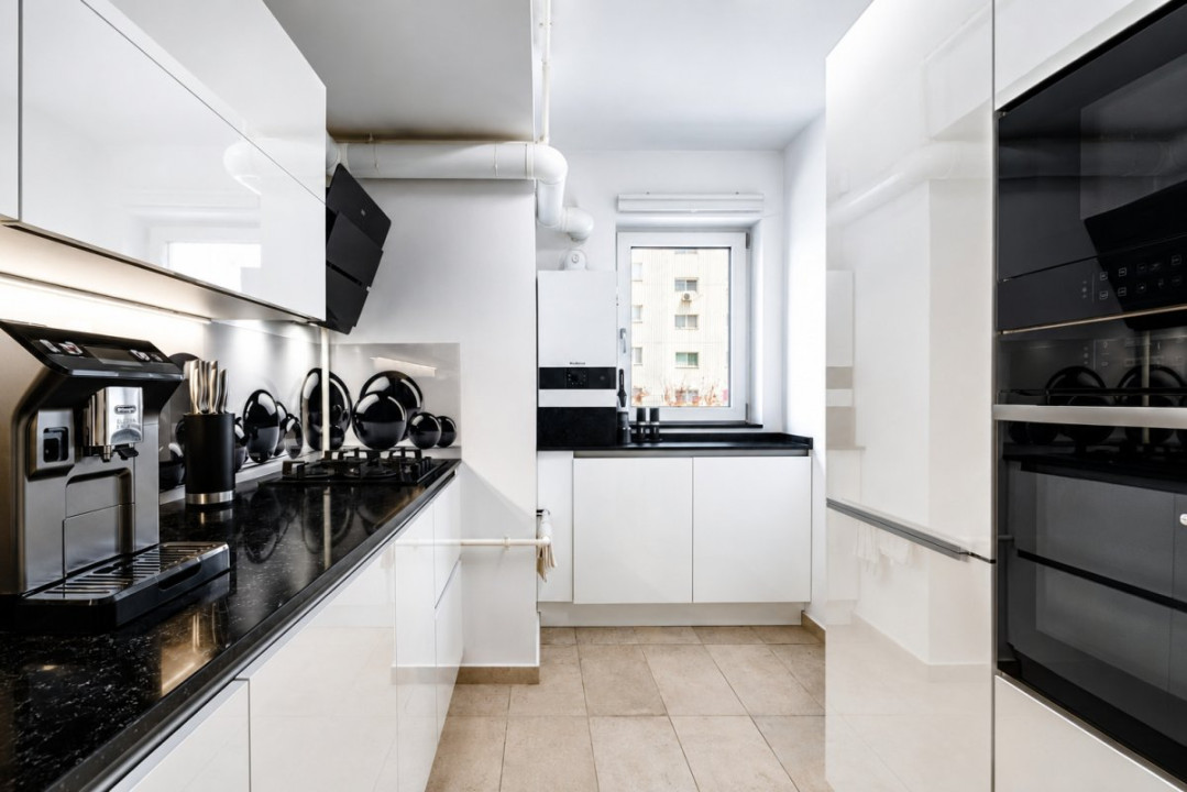 Apartament cu terasa cat o gradina, trei boxe si doua locuri de parcare subteran