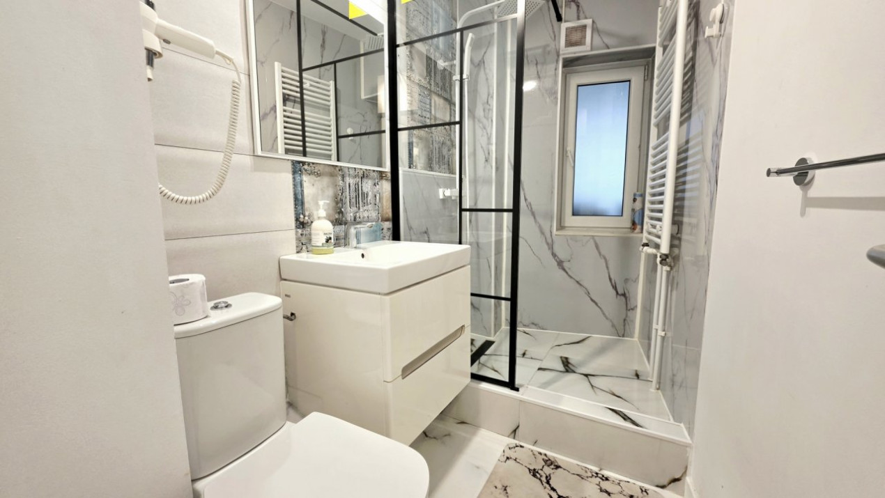 Eleganta urbana la Piata Unirii. O adresa, doua experiente de locuire